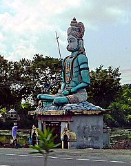 Roadside Hanuman shrine south of Chennai, Tamil Nadu. Hanuman statue and shrine. South of Chennai.jpg