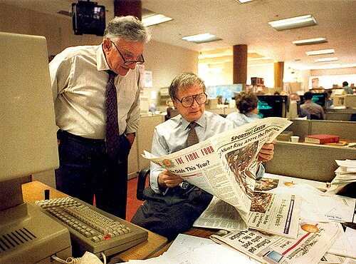 Bill German (left), the Chronicle's editor emeritus, and Page One editor Jack Breibart in the newsroom, March 1994