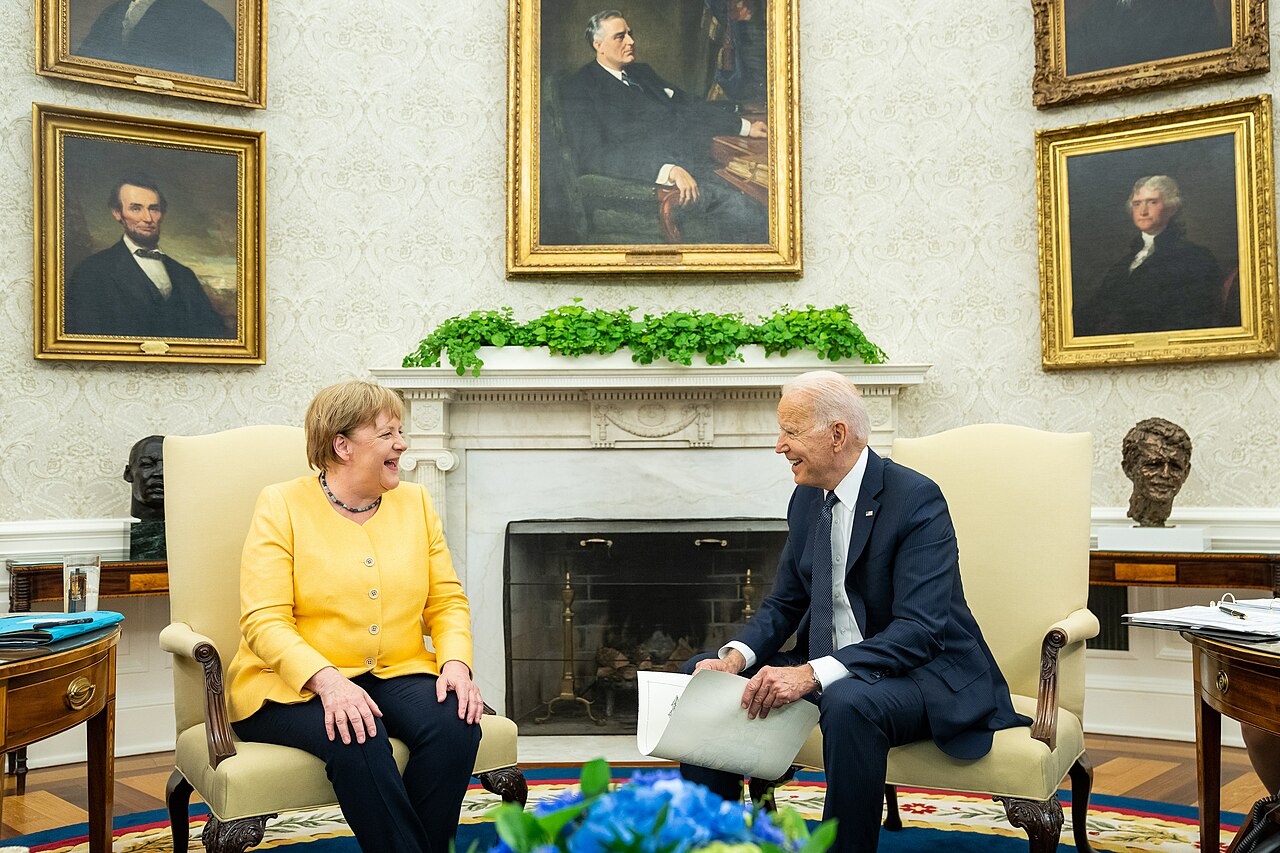 photograph of Merkel and Biden