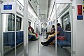 Interior of the KTM class 92, end coaches feature longitudinal seating.