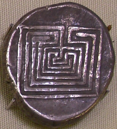 Silver coin from Knossos displaying the 7-course "Classical" design to represent the Labyrinth, 400 BC