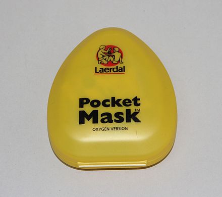 A pocket mask in its case.