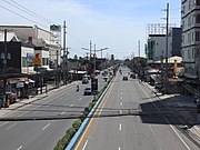 Paint-separated Class II bicycle lane along Manuel L. Quezon National Highway in Lapu-Lapu City