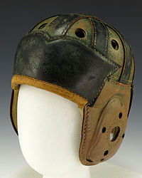 Leather helmets, the predecessor of modern football helmets, were designed to protect players from head injuries. Leather football helmet (circa 1930's).JPG