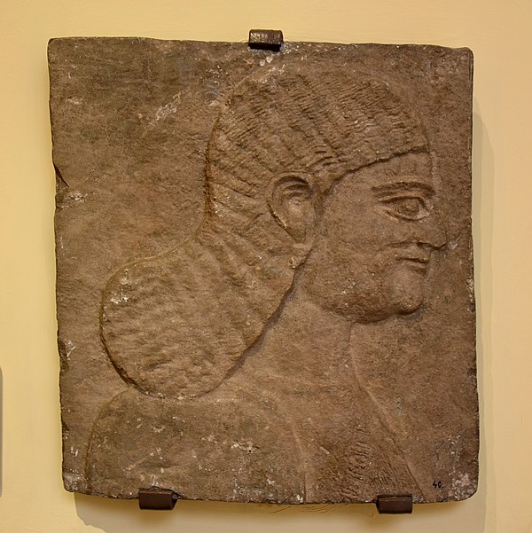 Limestone wall relief depicting an Assyrian royal attendant, a eunuch. From the Central Palace at Nimrud, Iraq, 744–727 BCE. Ancient Orient Museum, Is