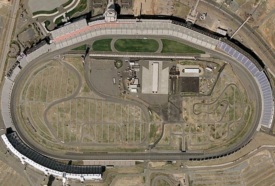 A satellite view of Charlotte Motor Speedway, a typical NASCAR track with a quad-oval configuration. The infield roval also hosts a Cup Series event, with the inaugural event in 2018.