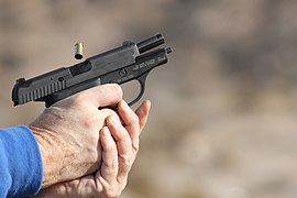 Man Firing SIG Sauer P239.jpg