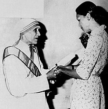 Mother Teresa with Michele Duvalier in January 1981. Mother Teresa & Michele Duvalier.jpg