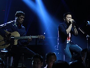 Guitarist Lukman and songwriter/vocalist Ariel perform during an acoustic performance in Yogyakarta, Indonesia on December 20, 2013