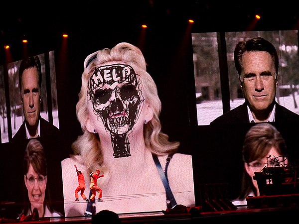 Dancers practicing slacklining during the video interlude of "Nobody Knows Me", which morphed Madonna's face with a number of famous figures, on the M