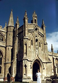 Ornate two-storey "Perpendicular"-style south porch of 1480 at Northleach, Gloucestershire Northleach Parish Church 1990.jpg