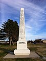 Obelisco en Farwell que conmemora la red de carreteras de Ozark