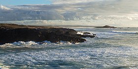 Isla Pessegueiro, vista desde Porto Covo, en un día de invierno