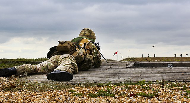 A reservist Gunner with 504 (County of Nottingham) Squadron, Royal Auxiliary Air Force fires a machine gun during two weeks Annual Continuous Training