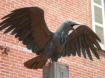 Detail of the statue of a raven on the grounds...