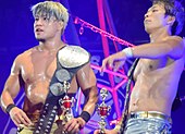 Roppongi 3K as the IWGP Junior Heavyweight Tag Team Champions and the winners of the 2017 Super Jr. Tag Tournament Roppongi 3K Super Junior Tag Tournament Winners.jpg