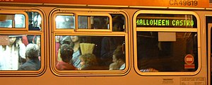 2006, the last year of the large organized street party, a crowded city bus with the destination "Halloween Castro." SF Muni Bus Destination Castro Halloween.jpg