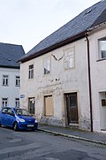 Residential house with extension in a corner