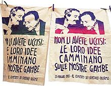 Sheets with the iconic picture of Giovanni Falcone and Paolo Borsellino, exposed as a sign of protest against Italian Mafia. They read: "You did not kill them: their ideas walk on our legs". Sheet Falcone Borsellino.jpg