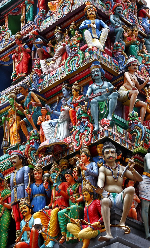 Humanity has developed extremely rapidly, arguably through gene-culture coevolution, leading to complex cultural artefacts like the gopuram of the Sri