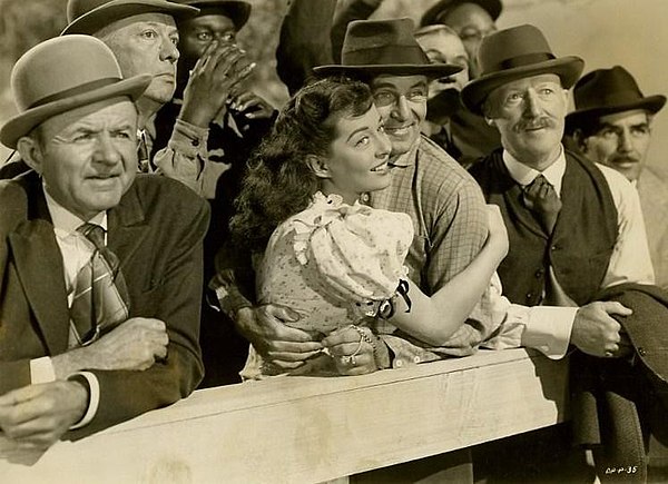 Film still with Gail Russell and John Hoyt (center)