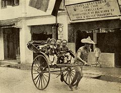 Image 105Children in a rickshaw pulled by a Chinese coolie in Kuching around 1919 (from Malaysian Chinese)