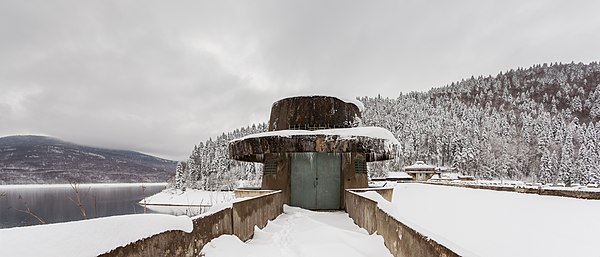 Winter scene of the watching tower, dam and Mavrovo Lake, Mavrovo National Park, Republic of Macedonia.