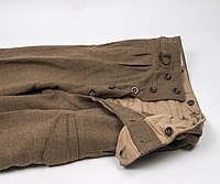 Vojenské kalhoty s poklopcem zapínaným na knoflíky (Nový Zéland, 50.-60. léta 20. stol.)