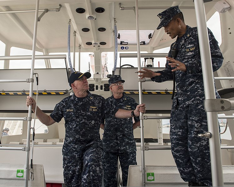 File:U.S. Navy Chief Hospital Corpsman Jashir Setias, right, discusses the capabilities of a rescue boat to Vice Adm. Matthew L. Nathan, left, the Navy surgeon general and the chief of the Bureau of Medicine 140629-N-OL084-292.jpg