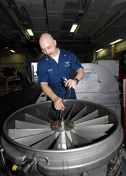 File:US Navy 090622-N-6720T-023 Aviation Machinists Mate 2nd Class Shaun Elling, assigned to the jet engine shop in the aviation intermediate maintenance department, performs maintenance on an F-A-18E Super Hornet engine.jpg