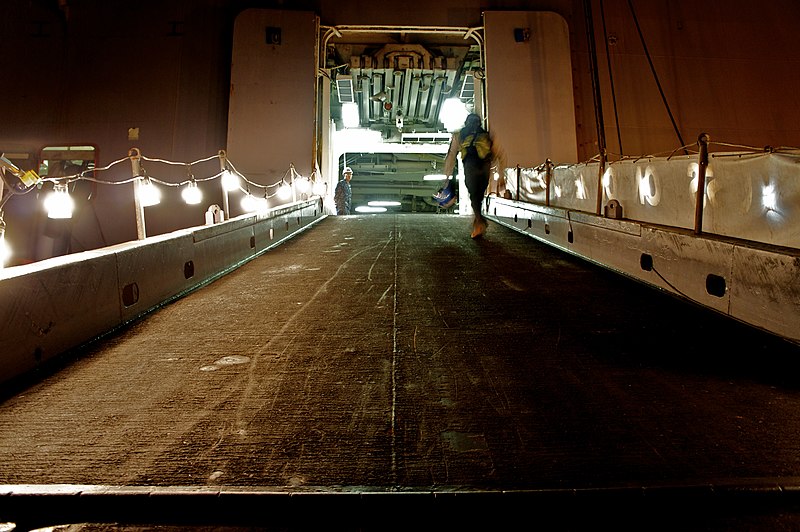 File:US Navy 101118-N-9643K-869 Operations Specialist Seaman Michael Pa stands watch as a shipyard worker walks up the ramp to the quarterdeck aboard th.jpg