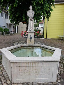 Uli Schad fountain in Oberdorf, Baselland, Switzerland.  Created by Fritz Bürgin.