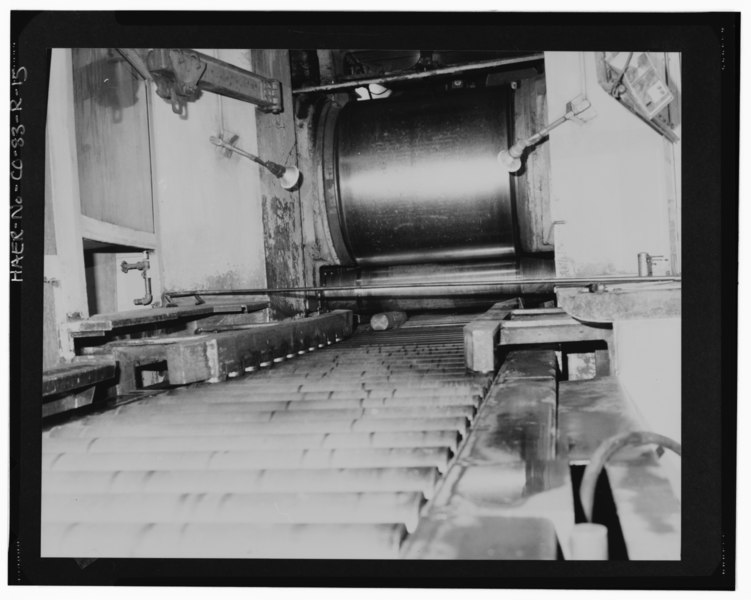 File:VIEW OF ROLLING OPERATION. INGOTS AND BAR STOCK WERE ROLLED TO A SPECIFIED THICKNESS IN PREPARATION FOR FURTHER PROCESSING. (11-82) - Rocky Flats Plant, Uranium Rolling and HAER COLO,30-GOLD.V,1R-15.tif