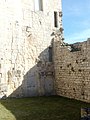 Français : Façade sud de la chapelle, chemin de ronde et ancienne prison, château de Villebois-Lavalette, Charente, France