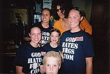 Members of the Westboro Baptist Church posing with Howard Stern at their appearance on his show.