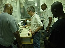 Studying the console at the WMXP-LP Barnraising, June 2007. WMXP Barnraising 6-07.jpg