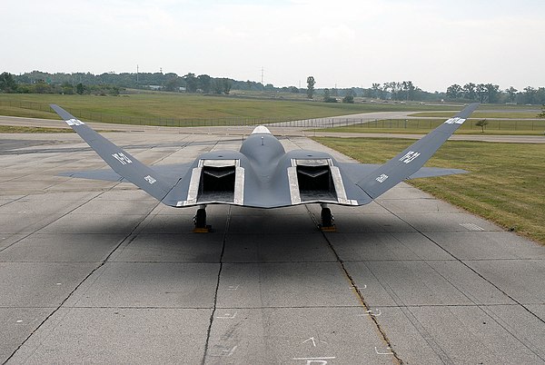 A rear view of a YF-23, showing its tile-lined exhaust channels