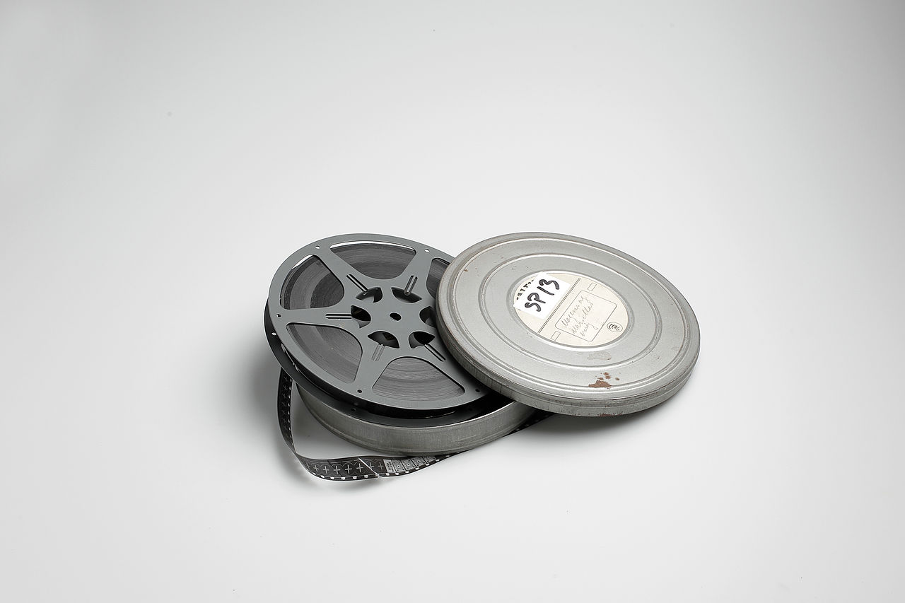 Film Reel Canisters Isolated On Grey Stock Photo 270006446