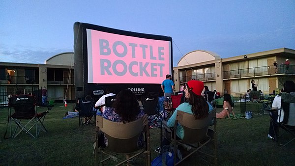 Fans watch a showing in Hillsboro, TX at the motel where much of the movie was filmed.