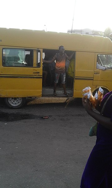 File:A typical danfo-bus conductor.jpg