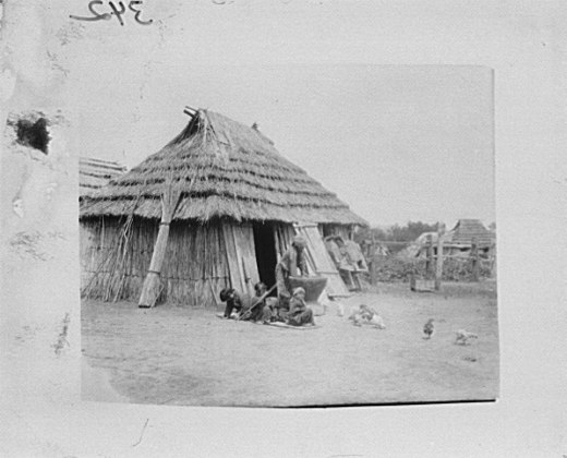 File:Ainu women and children outside a hut LOC agc.7a10345.tif