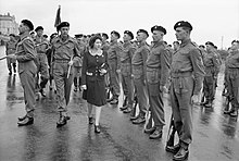 Princess Elizabeth inspecting an honour guard during a Royal visit to 2nd (Armoured) Battalion Grenadier Guards, 5th Guards Armoured Brigade, Guards Armoured Division, at Hove, 17 May 1944. Allied Preparations For D-day H38532.jpg