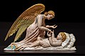 Angel Leaning over a Child 1870-1900.jpg