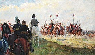 Napoleón por detrás, seguido de sus oficiales, aclamado por lanceros vestidos de rojo y azul.