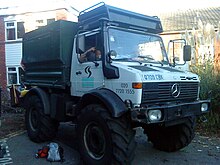 Arborists may use specialised vehicles to gain access to trees, such as this Unimog equipped with a power take-off driven woodchipper Arboriculture Unimog.jpg