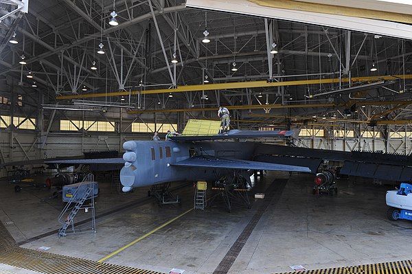 B-52H Stratofortress undergoing maintenance to its rudder with its fin folded