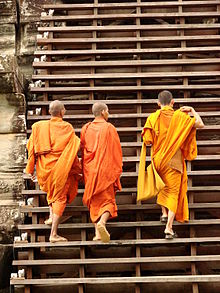 Modesty in dress for Buddhist monks visiting the Hindu-Buddhist temple complex Angkor Wat, Cambodia Buddhist Monks - Angkor Wat - Cambodia.JPG