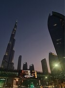 Burj Khalifa and surrounding buildings during sunset.jpg