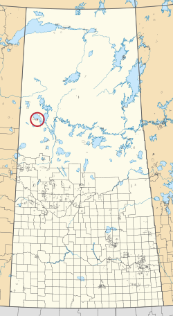 Saskatchewan vilayetinin 297 kırsal belediyesini ve yüzlerce küçük Kızılderili rezervini gösteren bir haritası. Biri kırmızı bir daire ile vurgulanmıştır.