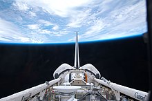 Atlantis' cargo bay and its vertical stabilizer Cargo bay of Atlantis on STS-132.jpg